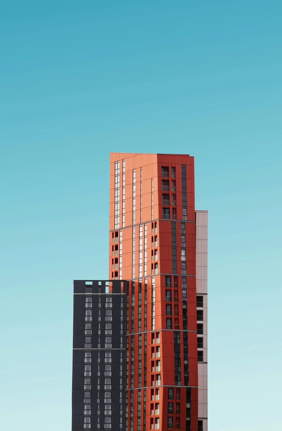 orange and black high rise building